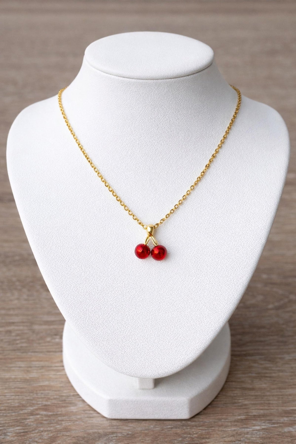 Collier cerise doré