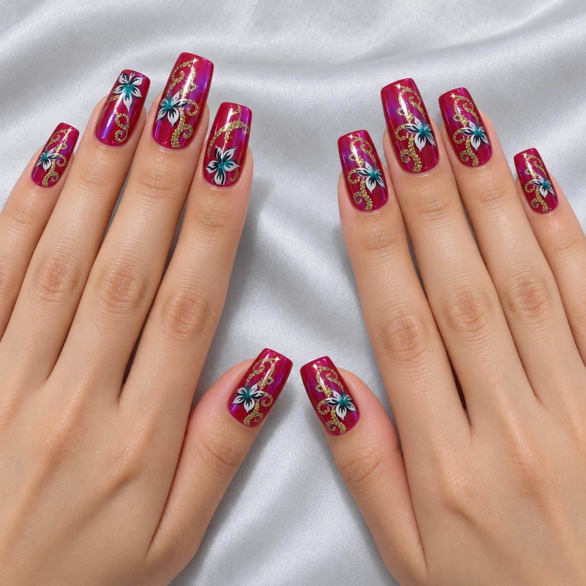 Faux ongles bordeaux à fleurs et arabesques dorées