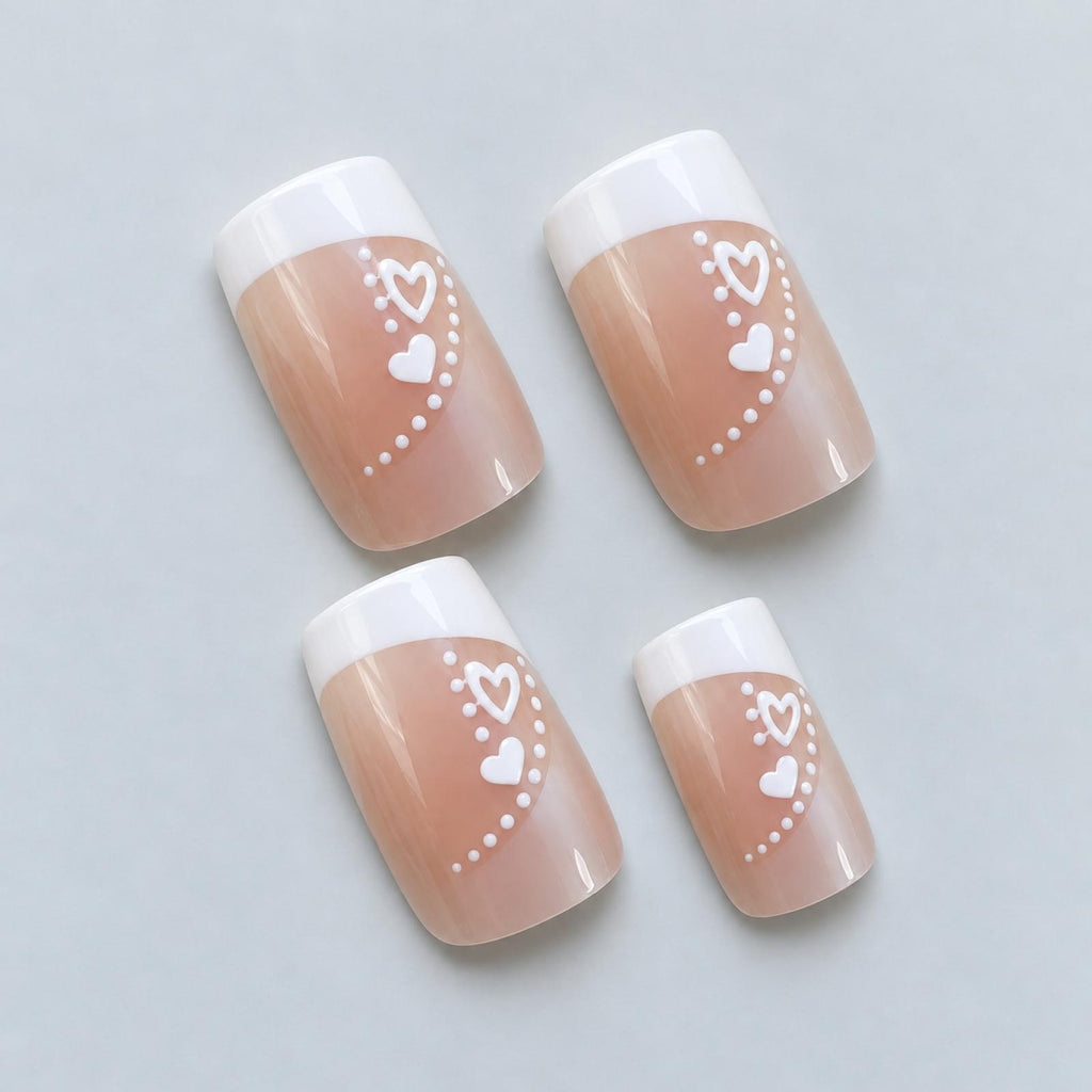 Faux ongles nacrés à cœurs et points blancs - vue 2