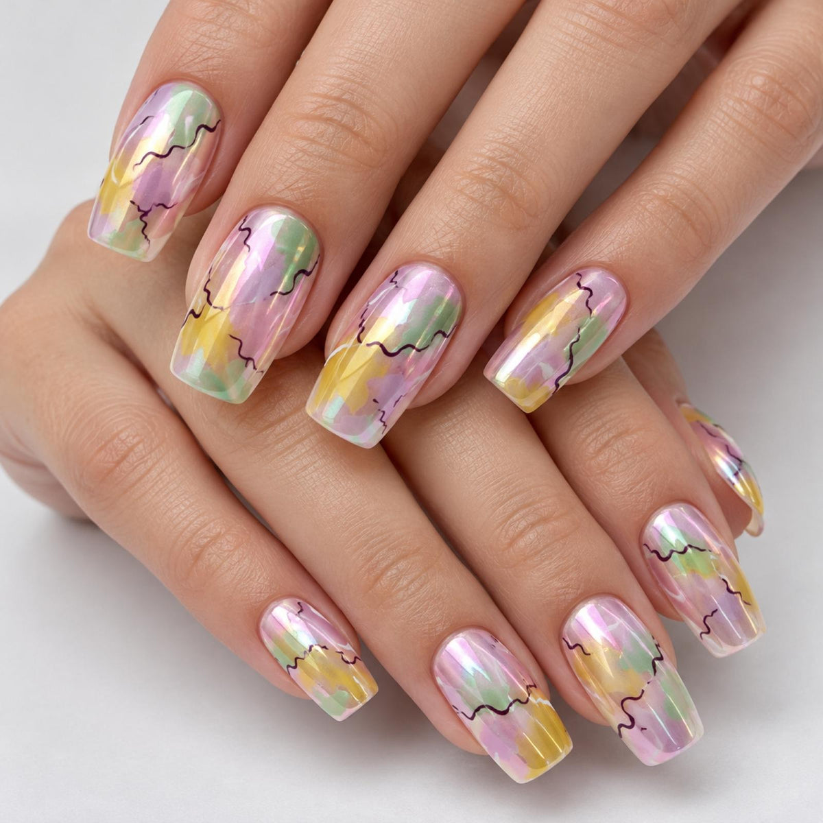 Faux ongles pastel à marbrures multicolores