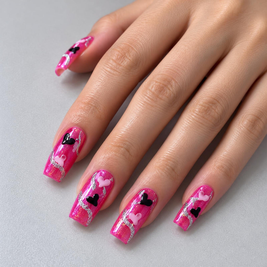 Faux ongles roses à cœurs et courbes scintillantes - vue 2