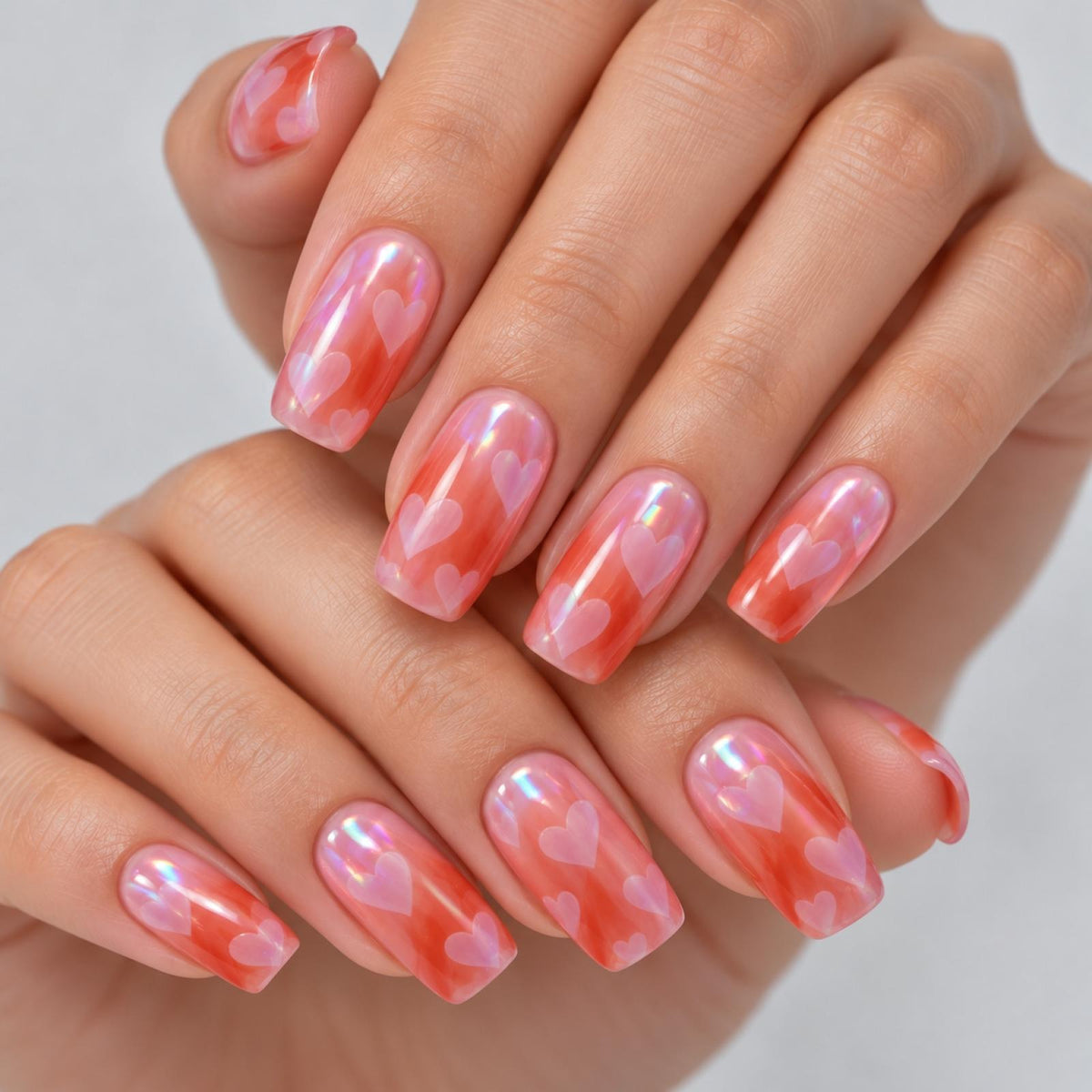 Faux ongles roses à fleurs ton sur ton