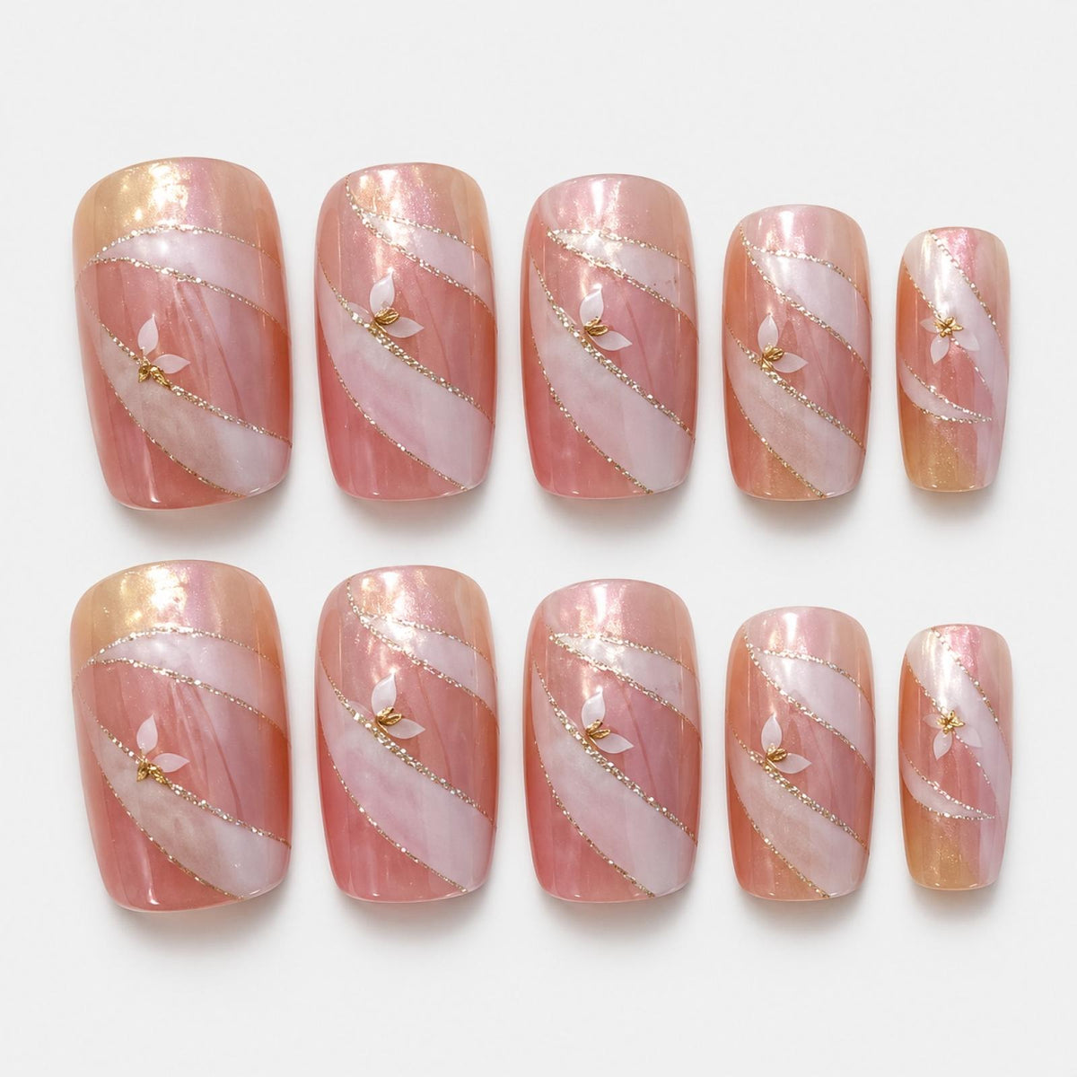 Faux ongles roses à rubans blancs et touches dorées - vue 4