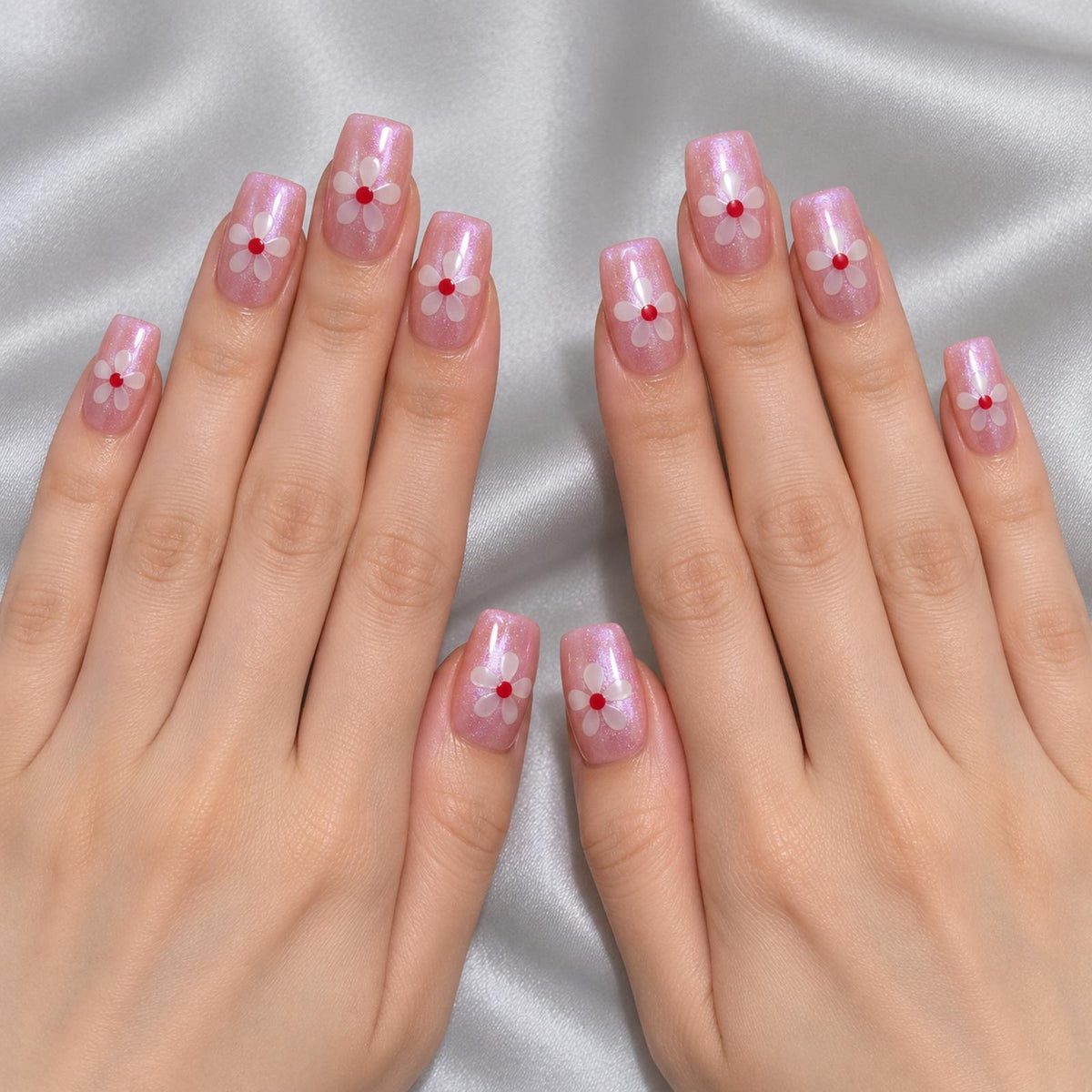 Faux ongles roses nacrés à fleurs blanches cœur rouge - vue 4