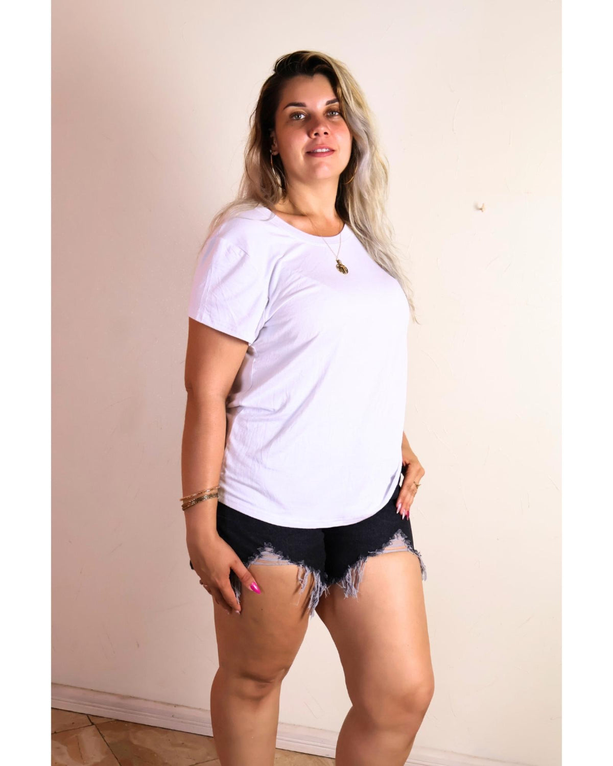 Short jean femme grandes tailles taille haute à ourlet effiloché